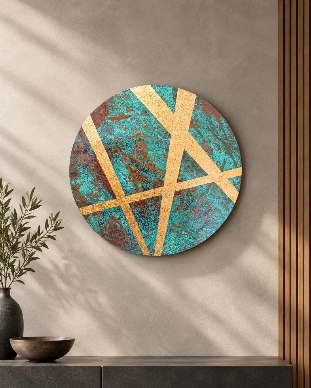 Starlight, an 800mm verdigris and copper disc, hung above a timber sideboard